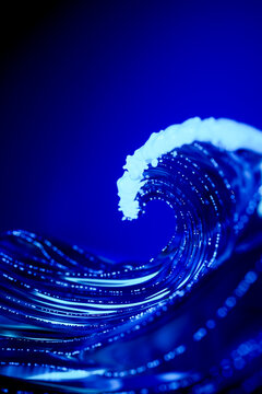 Immersive 3D virtual sea wave with electric blue light trails and futuristic information flow