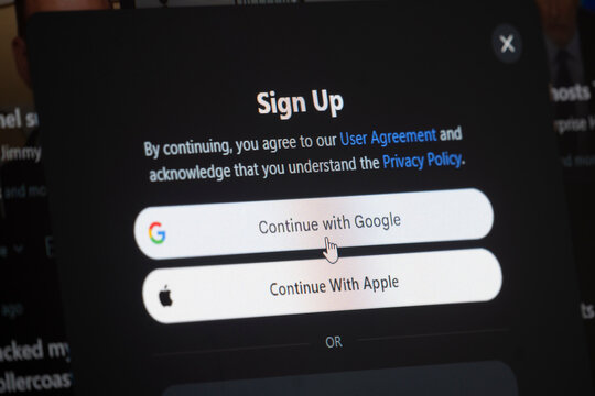 Mountain View, United States - 15 Oct 2026: Sign Up screen with Continue with Google and Continue With Apple options is seen on a computer screen.