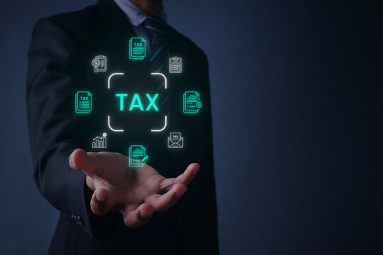 Businessman Showing Holographic Tax Document Icons Above Open Hand
