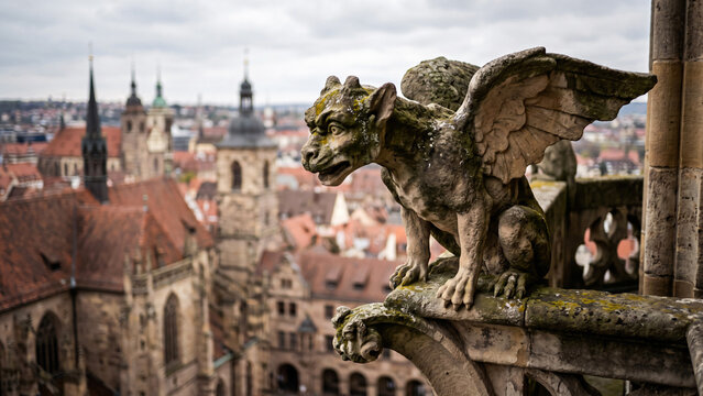 Ancient Stone Gargoyle Sculpture on Gothic Balcony