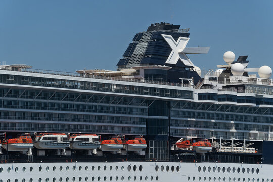 Rhodes - Greece, June 1, 2026: Sign and logo on the upper decks and funnel of a large Celebrity Cruises ship docked in the sunny port of Rhodes, Greece.