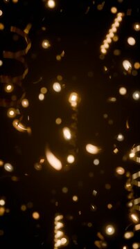 Gold confetti and streamers falling with bokeh loop vertical video