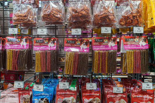 Villa de Alvarez, Colima. Mexico. June 24, 2026: Colorful Dog Treats and Chew Sticks Displayed on Supermarket Shelves
