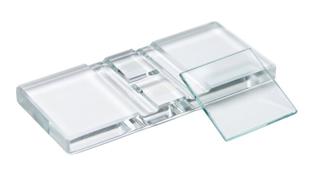 Hemocytometer counting chamber with cover glass, glass microscope slide isolated on white background, scientific research laboratory equipment