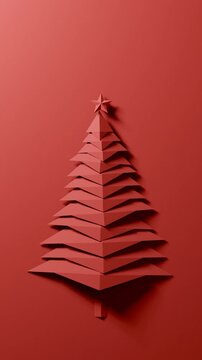 Red paper Christmas tree relief assembling vertical video