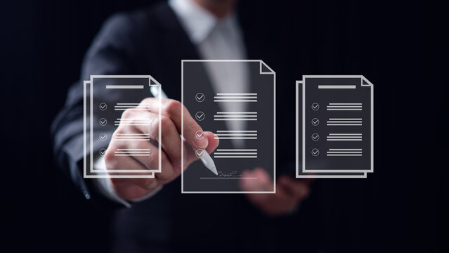 Businessman signing digital document with stylus on virtual interface with electronic signature, approval checklists and online contract management for modern business workflows.