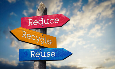 Reduce, recycle, reuse - colorful wooden signpost with three arrows, sky with clouds © PX Media