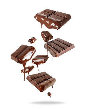 Broken chocolate bar with melted chocolate drips in the air on a transparent background