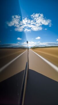 Vertical Timelapse From Moving Car Along Open Highway