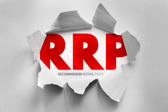 RRP stands for recommended retail price. Text shown under a ripped paper surface. Pricing strategy concept for consumer goods, manufacturing, and retail sales markets and distribution lines.