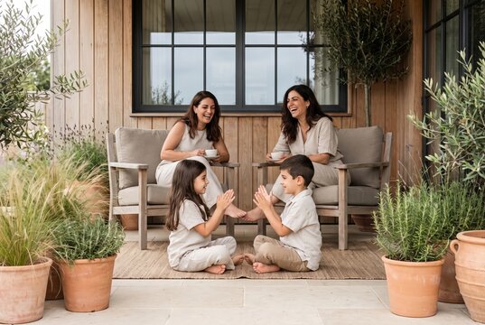 Family relaxing on the home terrace together
