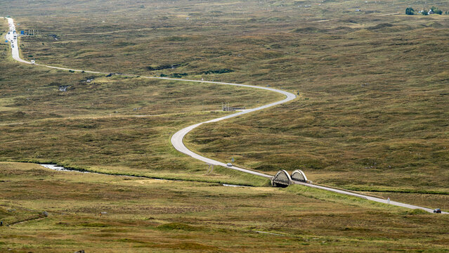 The A82 road winds it's way through Glencoe valley and over the River Etive Bridge towards the Highlands of Scotland
