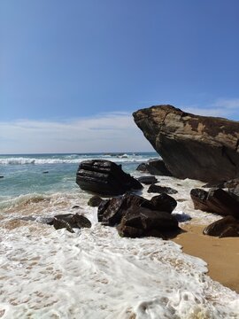 Sri Lanka Rocky Sea Shore with Crashing Ocean Waves and White Foam