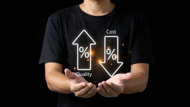 Man in black t-shirt holding glowing icons of increasing and decreasing cost