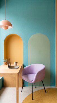Focused workstation nook with oak desk, laptop, lavender chair, mustard arch niche and teal wall