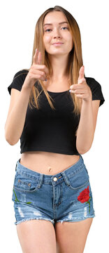 Woman using hand gestures while standing in a studio during a portrait session