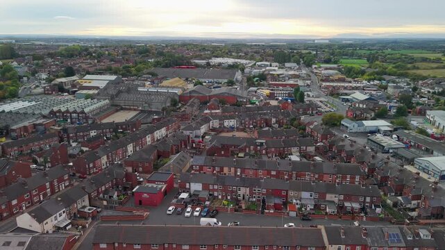 Aerial view of The Parish Church of All Saints, Castleford and surroundings with town neighborhoods. POV of West Yorkshire Town, England, United Kingdom.