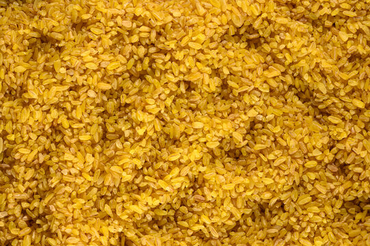 Close-up full frame background of raw bulgur wheat grains