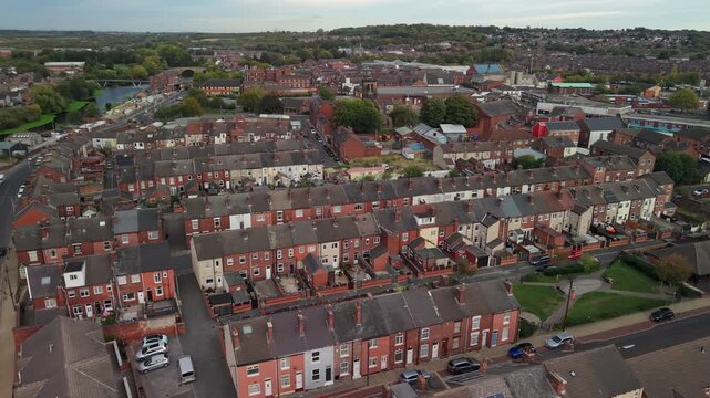 Aerial view of The Parish Church of All Saints, Castleford and surroundings with town neighborhoods. POV of West Yorkshire Town, England, United Kingdom.