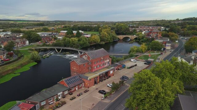 Aerial view of The Parish Church of All Saints, Castleford and surroundings with town neighborhoods. POV of West Yorkshire Town, England, United Kingdom.