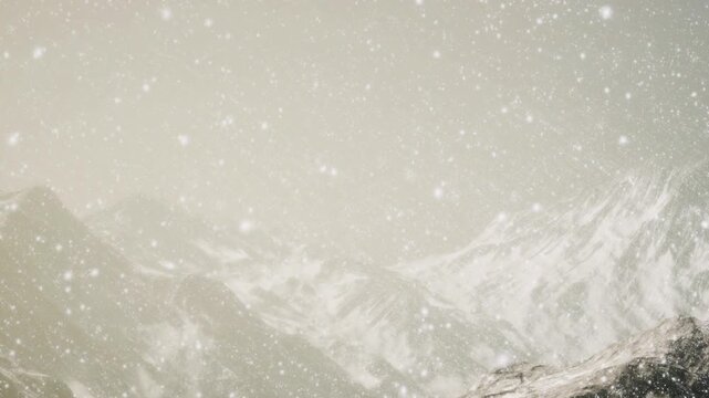 Gentle snow descends upon striking mountains, creating a serene, magical landscape. The atmosphere feels calm and peaceful, inviting reflection and appreciation for natures beauty.