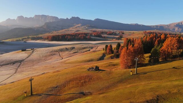 Aerial view of Alpine meadow mountain Plateau in autumn. South Tyrol, Italy