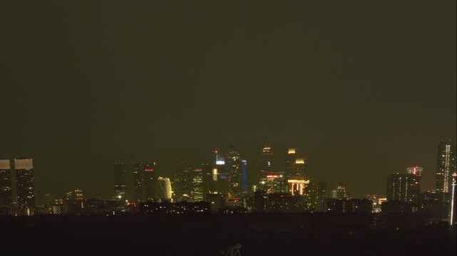 Timelapse panorama of Moscow city. Downtown of Russian capital. Modern building in old town. From day to night, sunset.