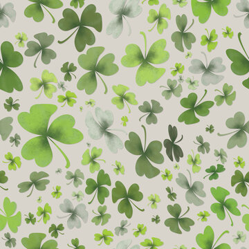 Beautiful watercolor seamless pattern featuring various sizes of green shamrocks and clovers scattered on a soft cream background