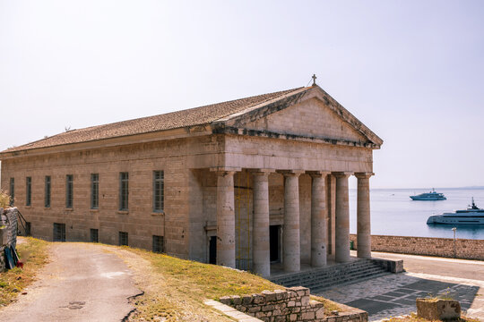 Stone Church of Agios Georgios inside Old Fortress, Corfu, Greece, sea and yachts beyond