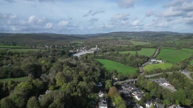 Buckfast, Devon, England: DRONE VIEWS: 1. Buckfastleigh; 2. A38 & A384 roads; 3. Village of Buckfast & Buckfast Abbey; 4. Dartmoor National Park in b/g. The Abbey is run by Benedictine monks.