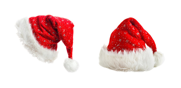 Red Santa Claus hats with silver snowflakes isolated on transparent background, Christmas plush caps set.