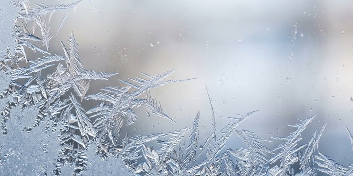 Frozen ice on the window at winter, snow on the window 