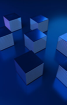 Vertical view of dark 3D cube stacks scattered on blue