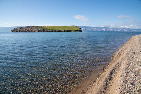 On the shores of Baikal lake. View of Kharantsy island on a September day. Irkutsk oblast, Russia
