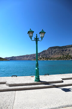 Period-style street lighting on the island of Symi, Greece.