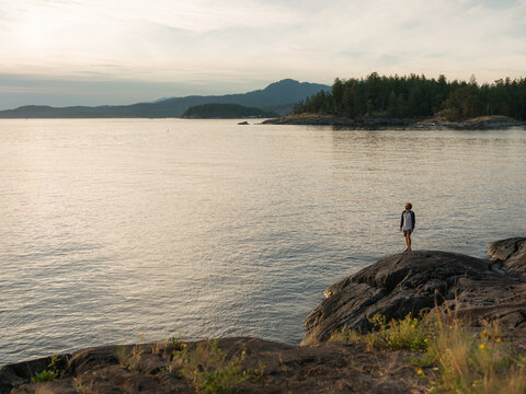Man looking at the ocean in British Columbia, Canada