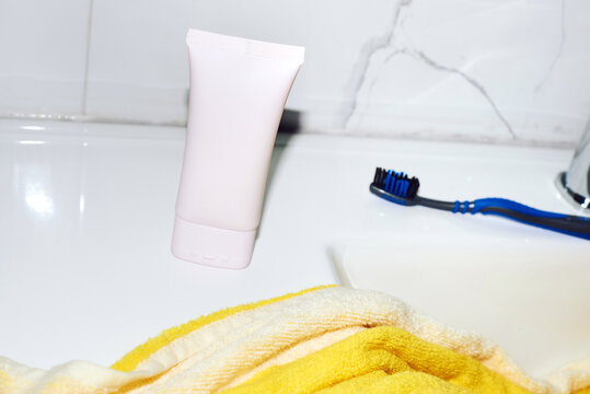 sink with toiletries and a towel.