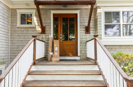Online package order delivered to door stairway of house