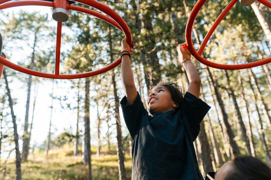 Child Exploring the Outdoors on a Playground