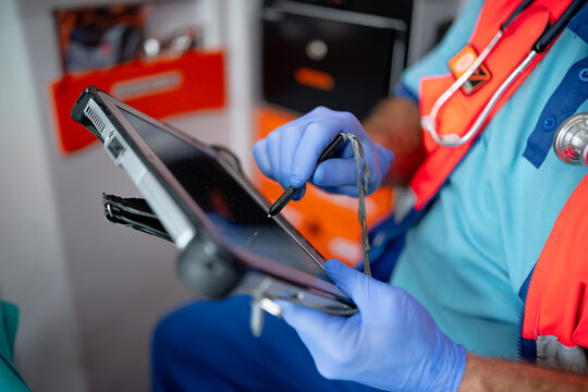 Paramedic using digital tablet
