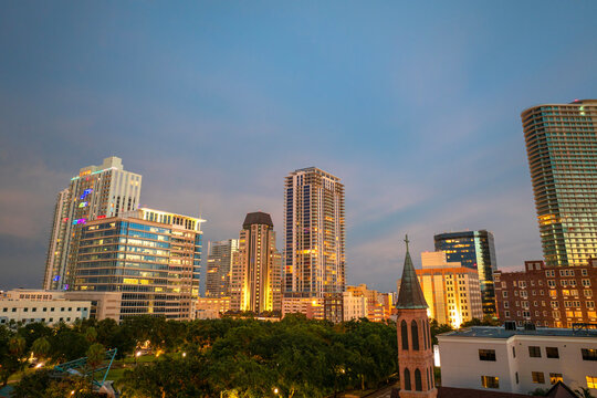 St. Petersburg, Florida, USA. View from above of skyline featuring high-rise condominiums, office buildings and urban parks at sundown.