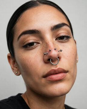 Alternative Beauty Close Up With Septum and High Nostril Piercings