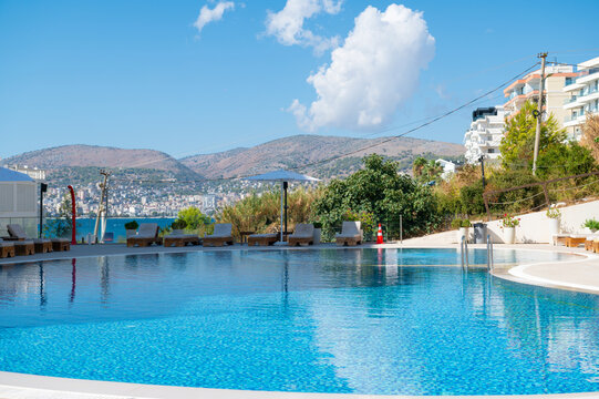 Swimming pool overlooking the bay and hills beside a hotel in Bodrum