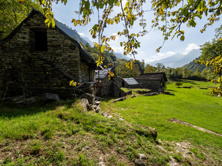 Old medieval houses along the Verzasca River trail (Sentiero Verzasca) from Sonogno to Lavertezzo, Switzerland © Catalin