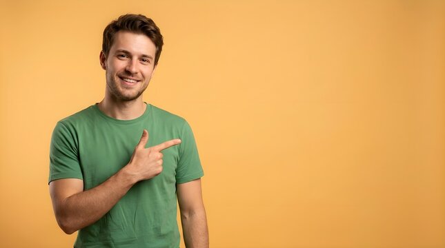 Casual Person Pointing at Copy Space with Finger Gesture, Product Promotion and Advertising Concept, Recommendation, Marketing Presentation, Studio Portrait on Orange Background