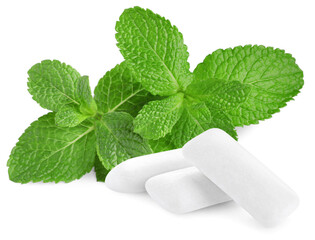 Menthol chewing gum pieces and green mint leaves isolated on white © New Africa