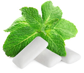 Menthol chewing gum pieces and green mint leaves against transparent background © New Africa