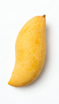 Delicate Nam Dok Mai Mango on a White Background, Highlighting Its Smooth Texture and Vibrant Color, Perfect for Food Photography and Culinary Use