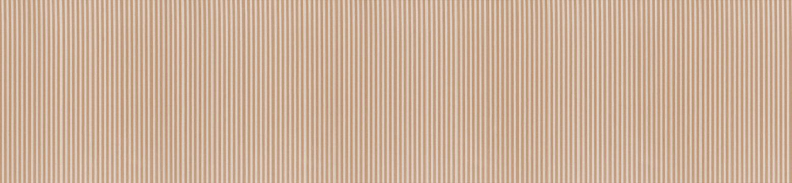 Light beige tan ribbed fabric texture surface with soft fine vertical striped textile weave