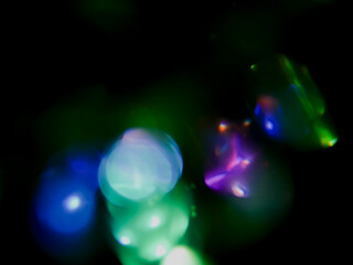 Abstract motion blur of car lights at night. Yellow and blue streaks glow against darkness. Perfect for themes like speed, nightlife, or urban travel. Suggests movement, mystery, and energy © mark_gusev